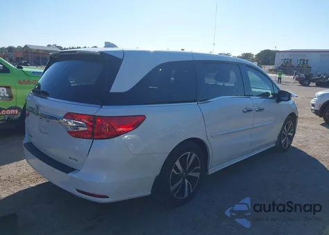 2019 Honda Odyssey Elite z USA, uszkodzony, nr VIN 5FNRL6H93KB105690